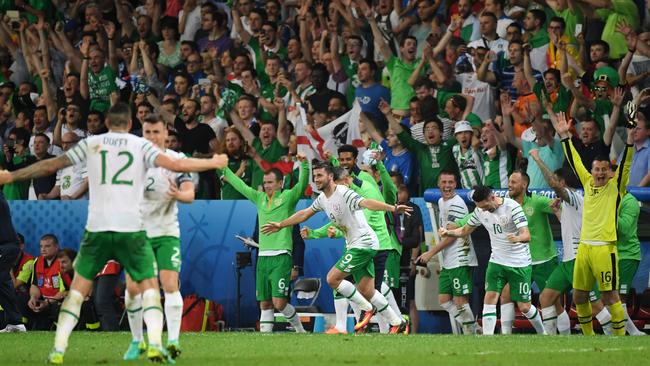 Ireland's players celebrate.