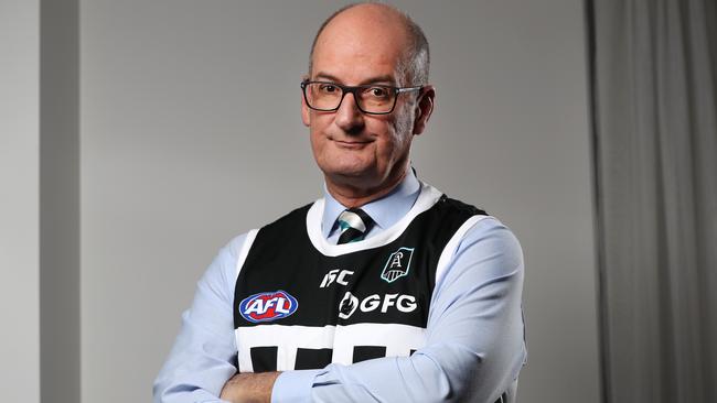 Port chairman David Koch proudly wears the club’s prison-bars jumper. Picture: Jonathan Ng