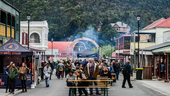 Festival goers try to enjoy a few moments in Queenstown's main St as the Unconformity Festival was cancelled. Picture: Chris Crerar