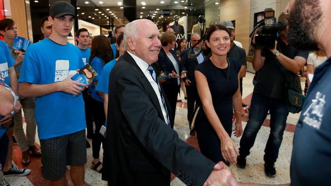 John Howard joins Liberal candidate for the seat of Reid, Fiona Martin on the campaign trail in Westfield Burwood. Picture: Toby Zerna