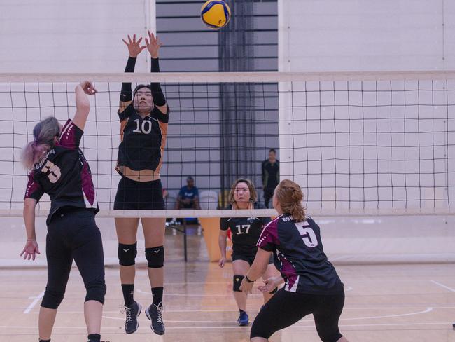 Action as Hard CorÃ“t V Haikyu in the Pan Pacific Masters Games Volleyball tournament. Picture: Glenn Campbell