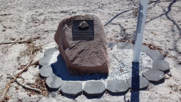 A recommendation was brought before the council on Wednesday to refuse a new Anzac Memorial at Hydeaway Bay due to its close proximity to the Dingo Beach Anzac Memorial (pictured). Photo: Whitsunday Regional Council