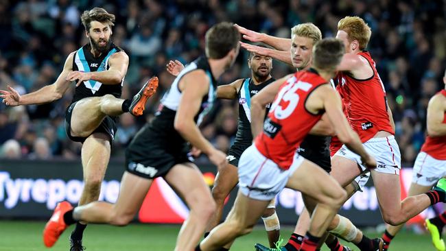 Justin Westhoff of the Power kicks for goal against the Bombers. Picture: AAP Image/Kelly Barnes