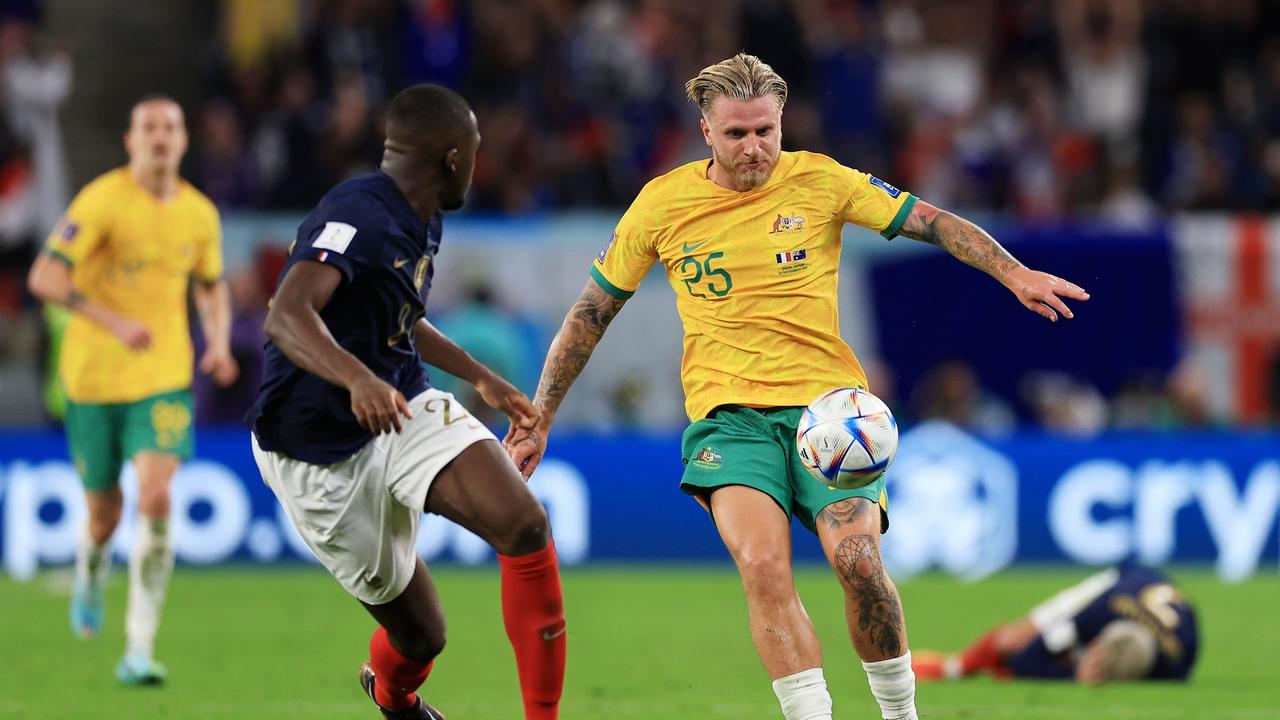 Jason Cummings of Australia in action against France.