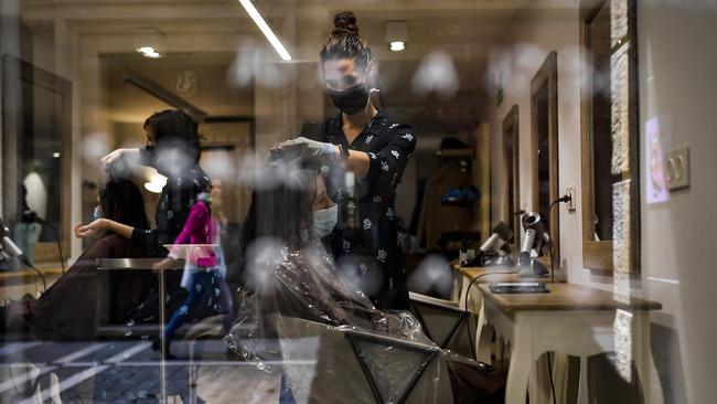 Women wearing face masks to protect against coronavirus in 2020. Picture: Alvaro Barrientos