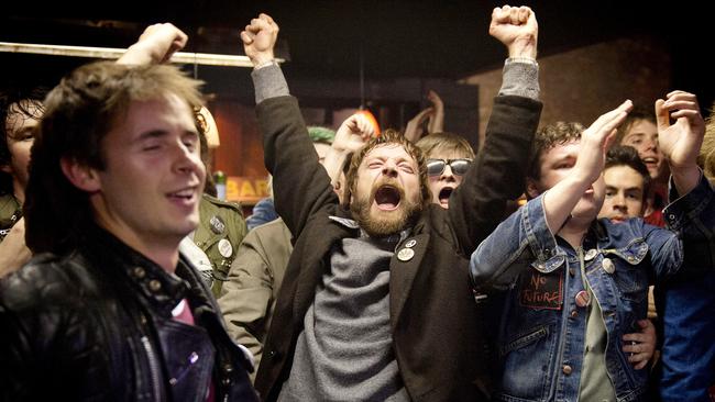 BELFAST MUSIC SCENE .. for Louise Goldsbury story .. Richard Dormer (portrays Terri Hooley) in a scene from Good Vibrations, a film about the punk scene in Belfast.