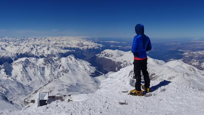 Steve Plain takes in the snowy European panorama from the summit of Mt Elbrus in Russia.