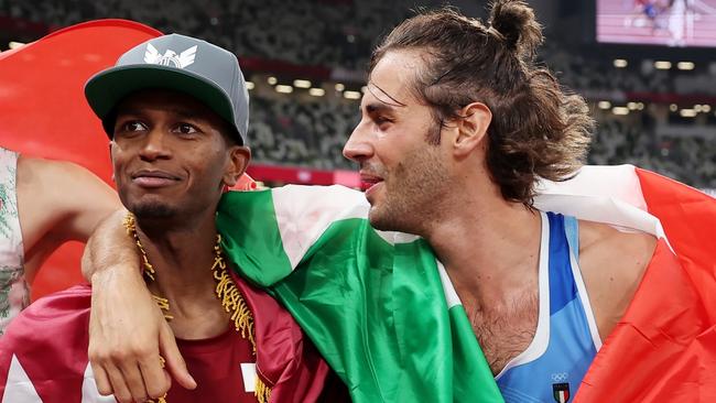 High jump gold medallists Mutaz Essa Barshim of Qatar and Italy’s Gianmarco Tamberi