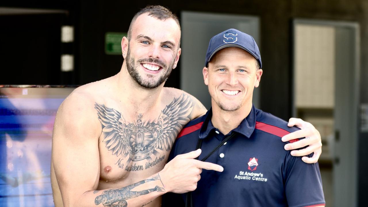 St Andrew's Anglican College swimming head coach Ash Delaney (right) and champion swimmer Kyle Chalmers. Picture: Facebook.