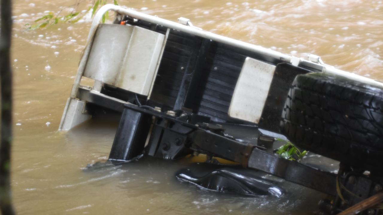 The submerged vehicle in Surprise Creek Road at Mount Ossa. A Calen woman was found inside the vehicle after it was swept off a flooded roadway about 5am on Wednesday, May 11, 2022. Picture: Max O'Driscoll