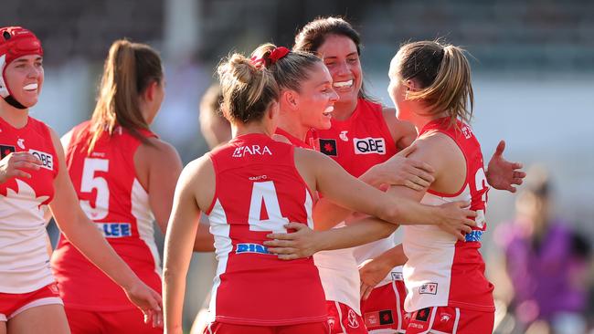 Laura Gardiner of the Swans celebrates with team mates during the round five AFLW match between Carlton Blues and Sydney Swans at Ikon Park, on September 29, 2023, in Melbourne, Australia. (Photo by Kelly Defina/Getty Images)