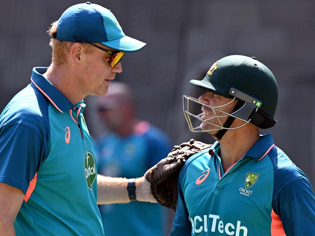 David Warner (R) has loved life under coach Andrew McDonald (L). Picture: William West/ AFP