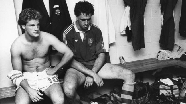 Wallabies Michael Lynagh (left) and Steve Cutler after the 1987 semi-final loss. Picture: Michael Amendolia.