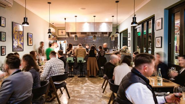 The dining room and kitchen at Good Gilbert wine bar, Goodwood.