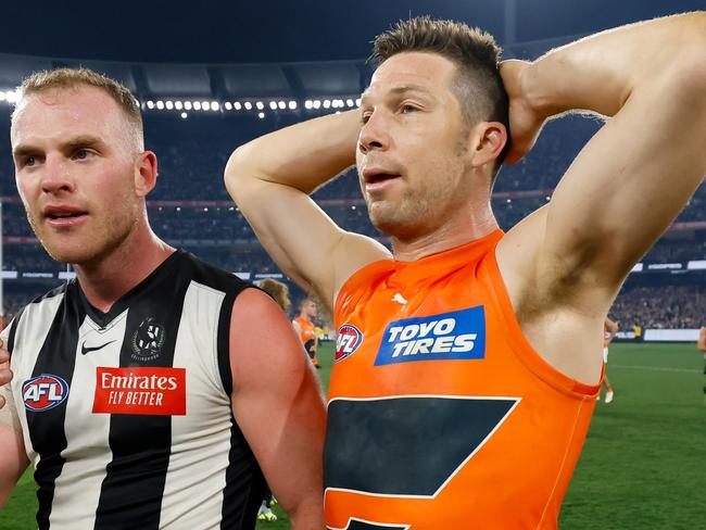 MELBOURNE, AUSTRALIA – SEPTEMBER 22: Tom Mitchell of the Magpies is seen with Toby Greene of the Giants during the 2023 AFL First Preliminary Final match between the Collingwood Magpies and the GWS GIANTS at Melbourne Cricket Ground on September 22, 2023 in Melbourne, Australia. (Photo by Dylan Burns/AFL Photos via Getty Images)