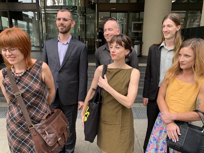 The anti-gas activists behind a controversial protest at the home of Woodside Energy boss Meg O'Neill will plead guilty to downgraded charges in Perth magistrate's court today. L-R, (Olive green dress) Joana Partyka, (Blue shirt and beard is Gerard Mazza, (Black shirt and shaved head) Jesse Noakes, ( Long hair and green shirt) Emil Davey,  (Red hair and checked dress)  Matilda Lane-Rose, (Yellow top)Tahlia Stolarski. Picture - Paul Garvey