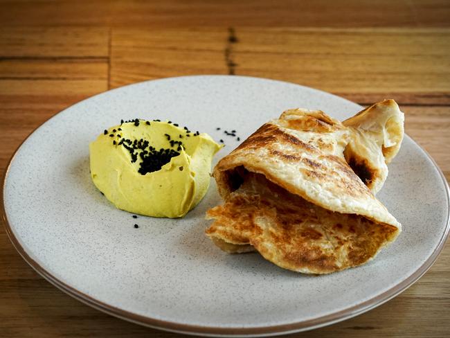 Drinks-led dining at Sparkle - grilled roti with dahl butter and nigella seeds, photographed Tuesday October 8, 2019 - pic AAP/MIKE BURTON