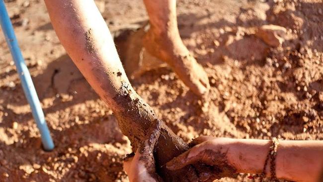 Mud play! Every kid deserves to get muddy. Picture: Alison Sarre