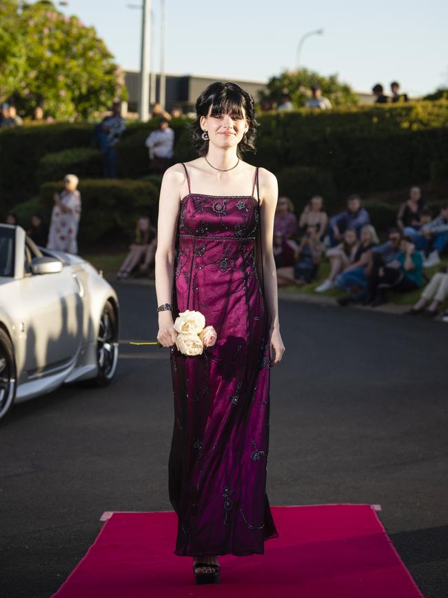 Bella Lewis arrives at Harristown State High School formal at Highfields Cultural Centre, Friday, November 18, 2022. Picture: Kevin Farmer