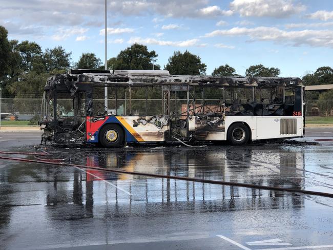 The remains of the burnt-out bus at the Mile End depot on Railway Tce. Picture: Rod Savage