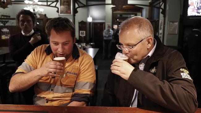 Prime Minister Scott Morrison meets locals at Molly Malone's Irish Pub in Devonport, Tasmania. Picture: AAP