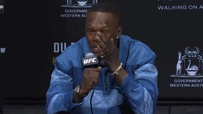 Adesanya wiped the tears out of his eyes. Photo: Fox Sports