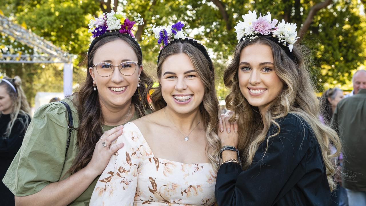At the Festival of Food and Wine are (from left) Kirsty Tait, Eloise Foley and Shelby Small, Carnival of Flowers 2022, Saturday, September 10, 2022. Picture: Kevin Farmer
