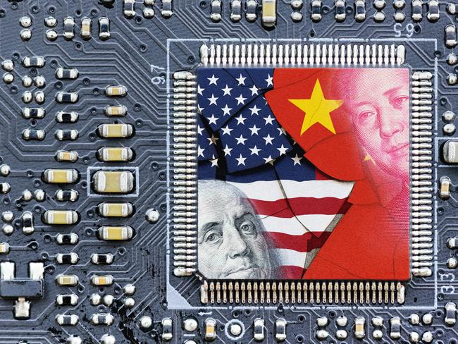 Flag of USA and China on a processor, CPU or GPU microchip on a motherboard. US companies have become the latest collateral damage in US - China tech war. US limits, restricts AI chips sales to China.