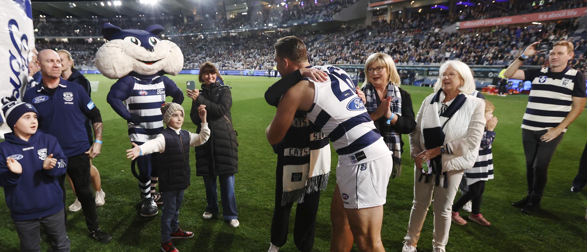 GEELONG, AUSTRALIA - MAY 10: Tom Hawkins of the Cats embrace family and friends before the round nine AFL match between Geelong Cats and Port Adelaide Power at GMHBA Stadium, on May 10, 2024, in Geelong, Australia. (Photo by Darrian Traynor/Getty Images)