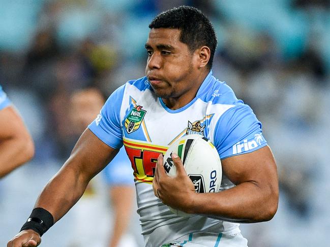 Moeaki Fotuaika of the Titans (centre) runs with the ball during the Round 21 NRL match between the Parramatta Eels and the Gold Coast Titans at ANZ Stadium in Sydney, Saturday, August 4, 2018. (AAP Image/Brendan Esposito) NO ARCHIVING, EDITORIAL USE ONLY