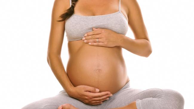 01/11/2011 FEATURES: Lovely pregnant lady against white background. Thinkstock. Pic. Supplied