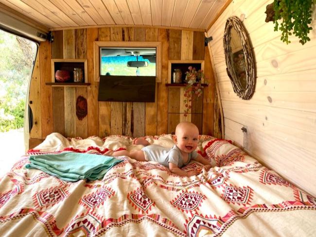Jamie Lawson and Andrew Garnett’s son Sonny inside one of their Blackbird Camper Co. converted campervans. Picture: Contributed