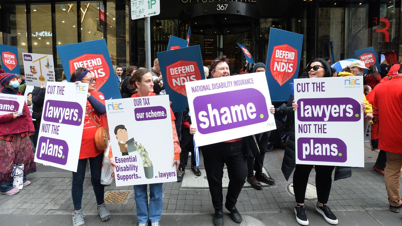 People with a disability and their advocates gather outside the National Disability Insurance Agency office in Melbourne to object millions of dollars being spent on lawyers to stop them accessing the NDIS. Picture: NCA NewsWire / Andrew Henshaw