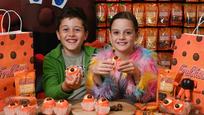 22nd September 2024 - Siblings Jimmy and Maple Apostolakos with the Fruchocs Frog Cakes at the Hahndorf Menz store. Photo: Naomi Jellicoe