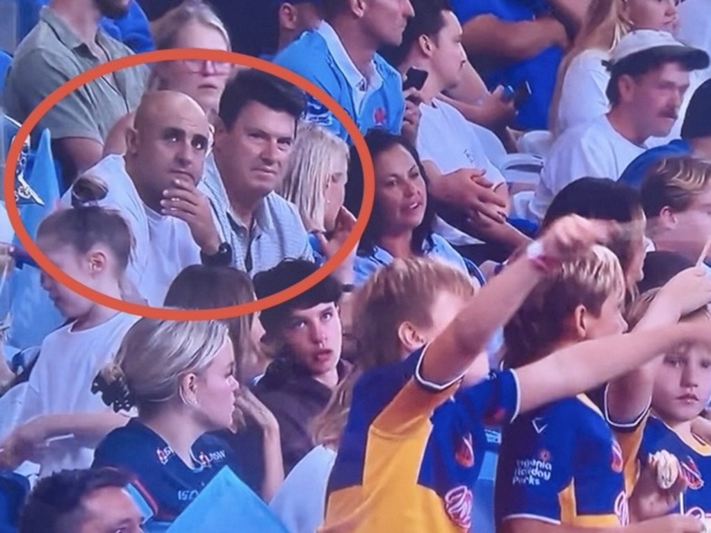 Isaac Moses and Hamish McLennan watching Joseph-Aukuso Suaalii play for the Waratahs. Picture: Stan Sport