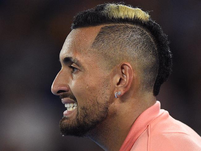 Nick Kyrgios of Australia looks on during his fourth round match against Rafael Nadal of Spain on day eight of the Australian Open tennis tournament at Rod Laver Arena in Melbourne, Monday, January 27, 2020. (AAP Image/Lukas Coch) NO ARCHIVING, EDITORIAL USE ONLY