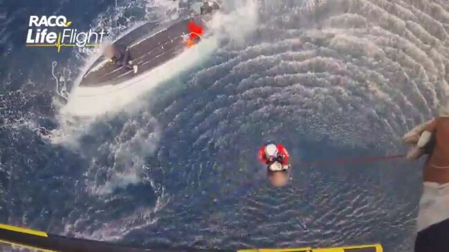 Pair winched to safety in boat rescue