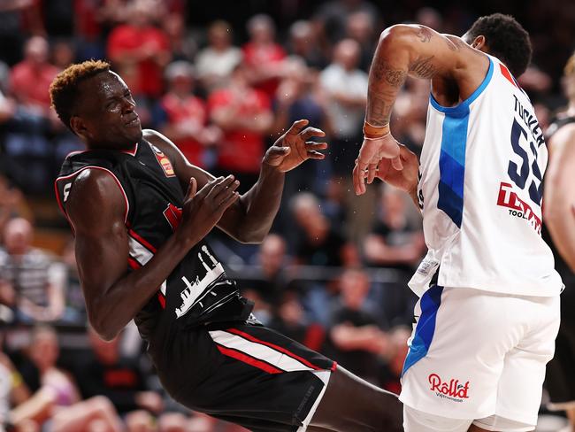 Tucker (R) and Deng (L) come together during the final quarter. Picture: Mark Metcalfe/Getty Images