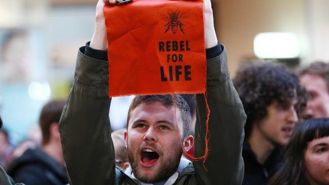 Climate protesters at Melbourne Central. Picture: Getty Images