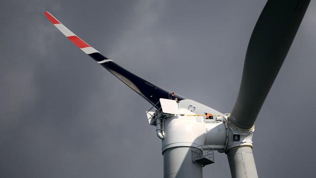 Macquarie has tilted towards renewable energy investments, and committed to reaching net zero operational emissions for the company by 2025. Picture: AFP