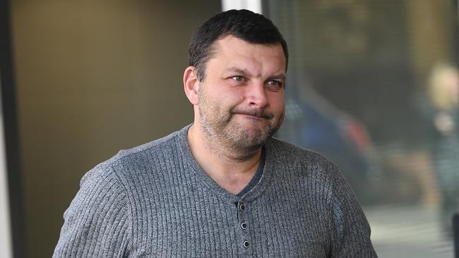 Seb Monsour leaves the police watchhouse in Brisbane in June. Picture: AAP Image/Dan Peled