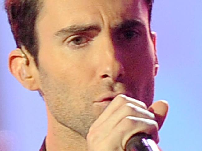 LOS ANGELES, CA - NOVEMBER 20: Singer Adam Levine of Maroon 5 performs onstage at the 2011 American Music Awards held at Nokia Theatre L.A. LIVE on November 20, 2011 in Los Angeles, California. (Photo by Kevork Djansezian/Getty Images)