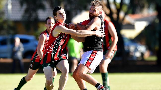 Para Hills’ Lynton Power is tackled by North Pines' Justin Wakefield in 2017. Picture: Bianca De Marchi