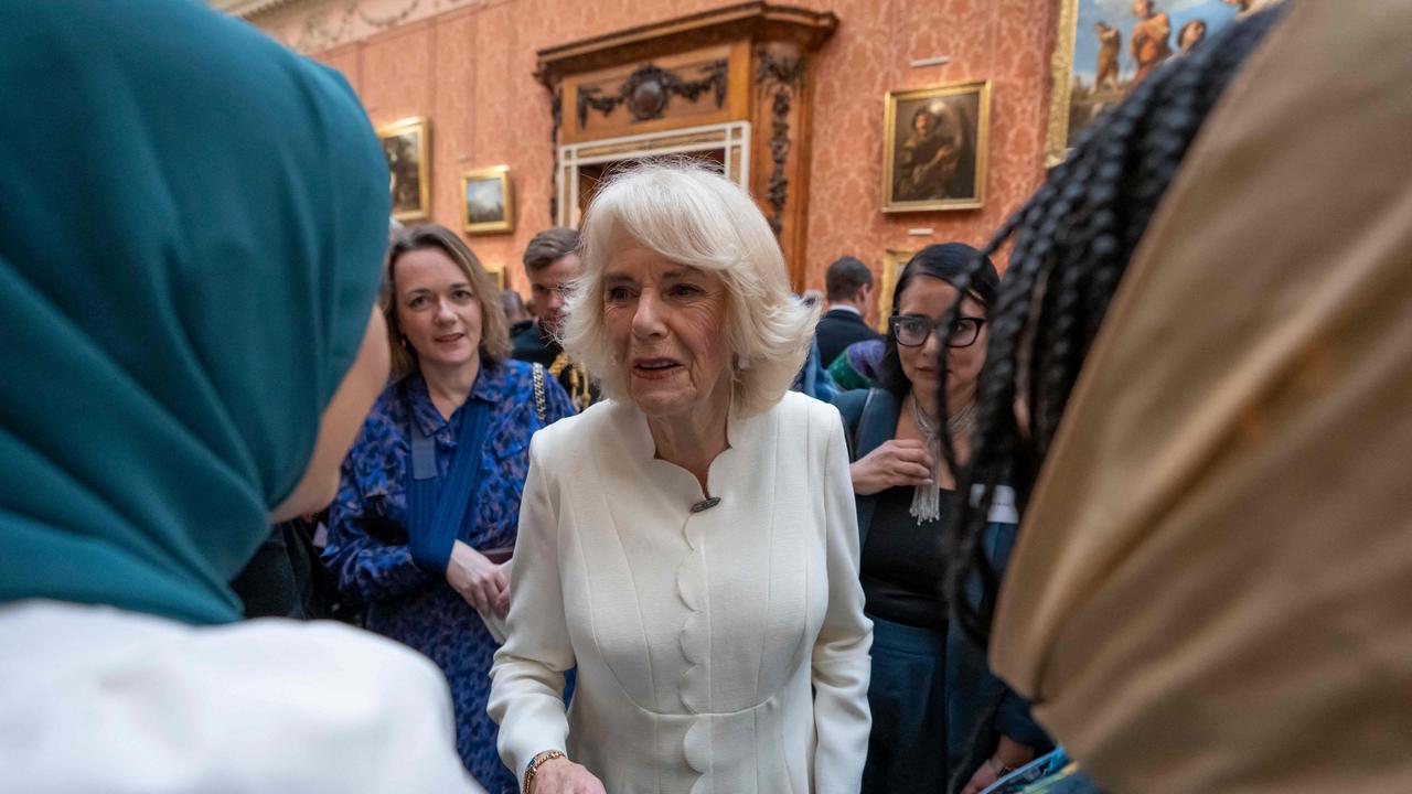 Queen Consort Camilla speaks to guests during a reception to raise awareness of violence against women and girls as part of the UN 16 days of Activism against Gender-Based Violence at Buckingham Palace in London (Photo by Kin Cheung / POOL / AFP)