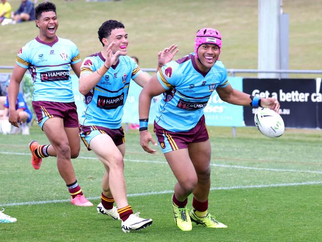 Jubo after No.3 Joseph Tupuse scores a try (pink head gear), Keebra park (Light) VÃs Mabel Park (Dark), at the Langer Trophy rugby league semi-finals, Nundah, Wednesday 7th August - Photo Steve Pohlner