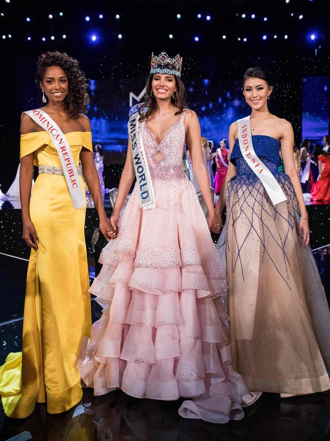 First runner up Miss Dominican Republic Yaritza Miguelina Reyes Ramirez ; Miss World 2016 Stephanie Del Valle of Puerto Rico; and second runner up Miss Indonesia Natasha Mannuela stand together after Del Valle’s win in the Miss World 2016 pageant at the MGM National Harbor December 18, 2016 in Oxon Hill, Maryland. Picture: AFP