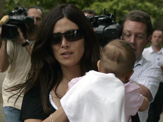 Mokbel’s girlfriend, Danielle McGuire, with infant baby daughter Renate.