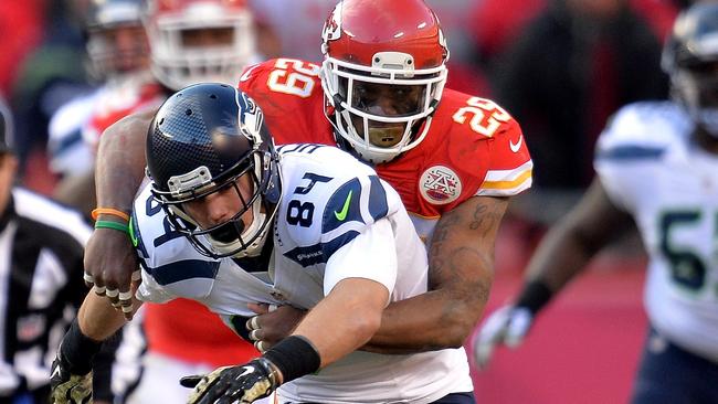 Eric Berry #29 of the Kansas City Chiefs breaks up a pass intended for the Seattle Seahawks.