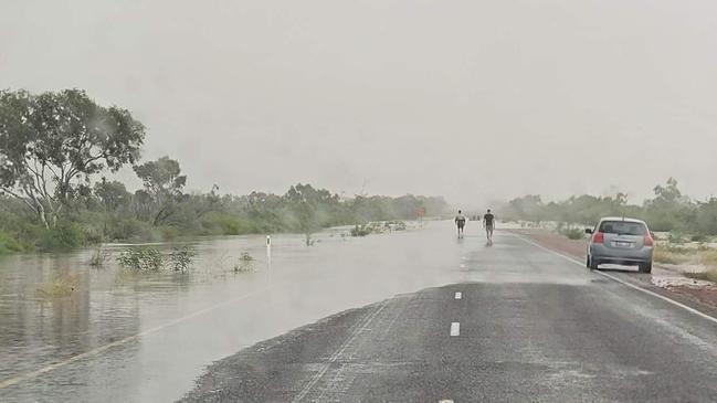 The Stuart Highway north of Tennant Creek remained inundated with water on Saturday morning, restricted to vehicles with high a clearance only. Picture: Supplied