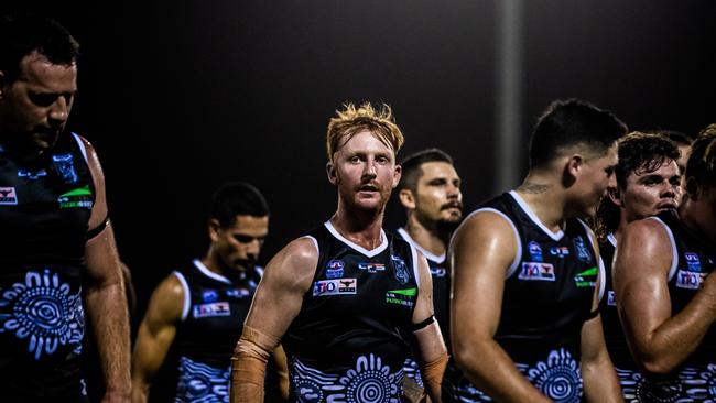 Eric Guthrie with his Palmerston Magpies teammates in the 2022-23 NTFL season. Patch Clapp / AFLNT Media